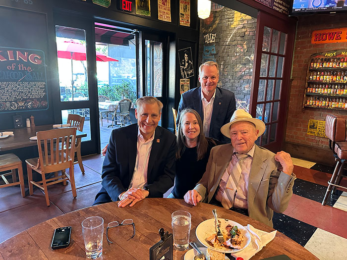 Mullen and Terrence Caster meeting with Rotary International's General Secretary John Hewko and Director Karena Bierman.